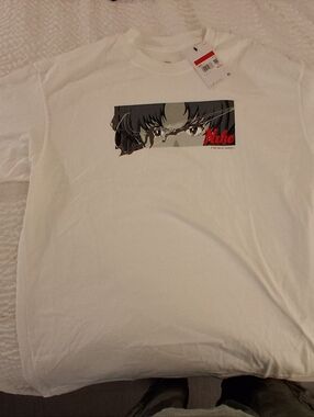 Nike White Short-Sleeve Tee with Anime Eyes Graphic